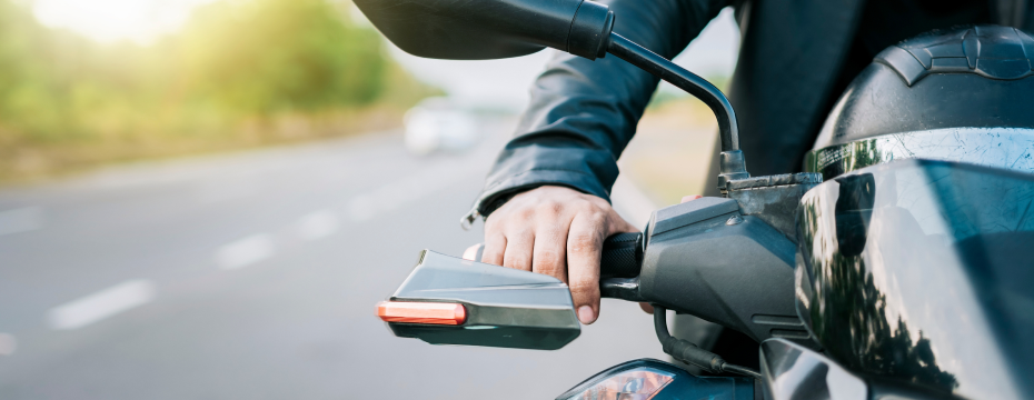 person riding motorcycle close up